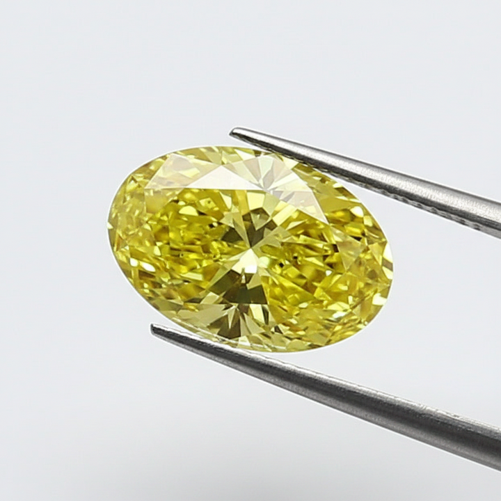 1,07 karaat ovale geslepen laboratoriumdiamant, VS2/fancy intens geel