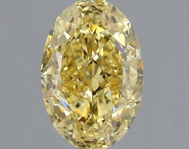 Diamante cultivado en laboratorio de talla ovalada de 1,16 quilates VVS2 amarillo intenso elegante