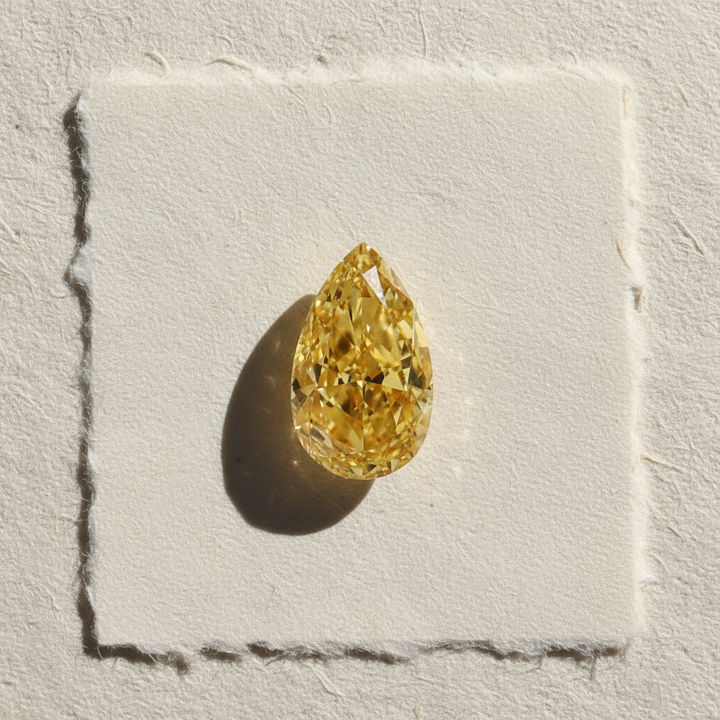 1.51 Carat Pear Cut Lab Grown Diamond VS1 Fancy Vivid Yellow IGI Certified
