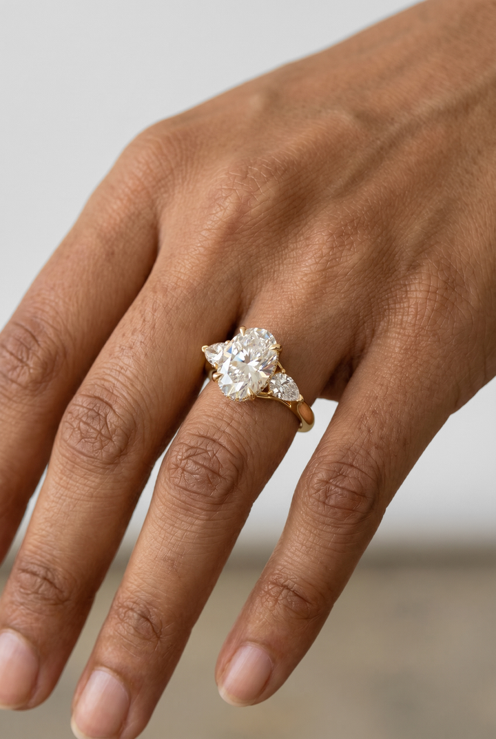 2.58 Ct Oval Lab Grown Diamond Ring with Pear Accent Diamonds in Yellow Gold