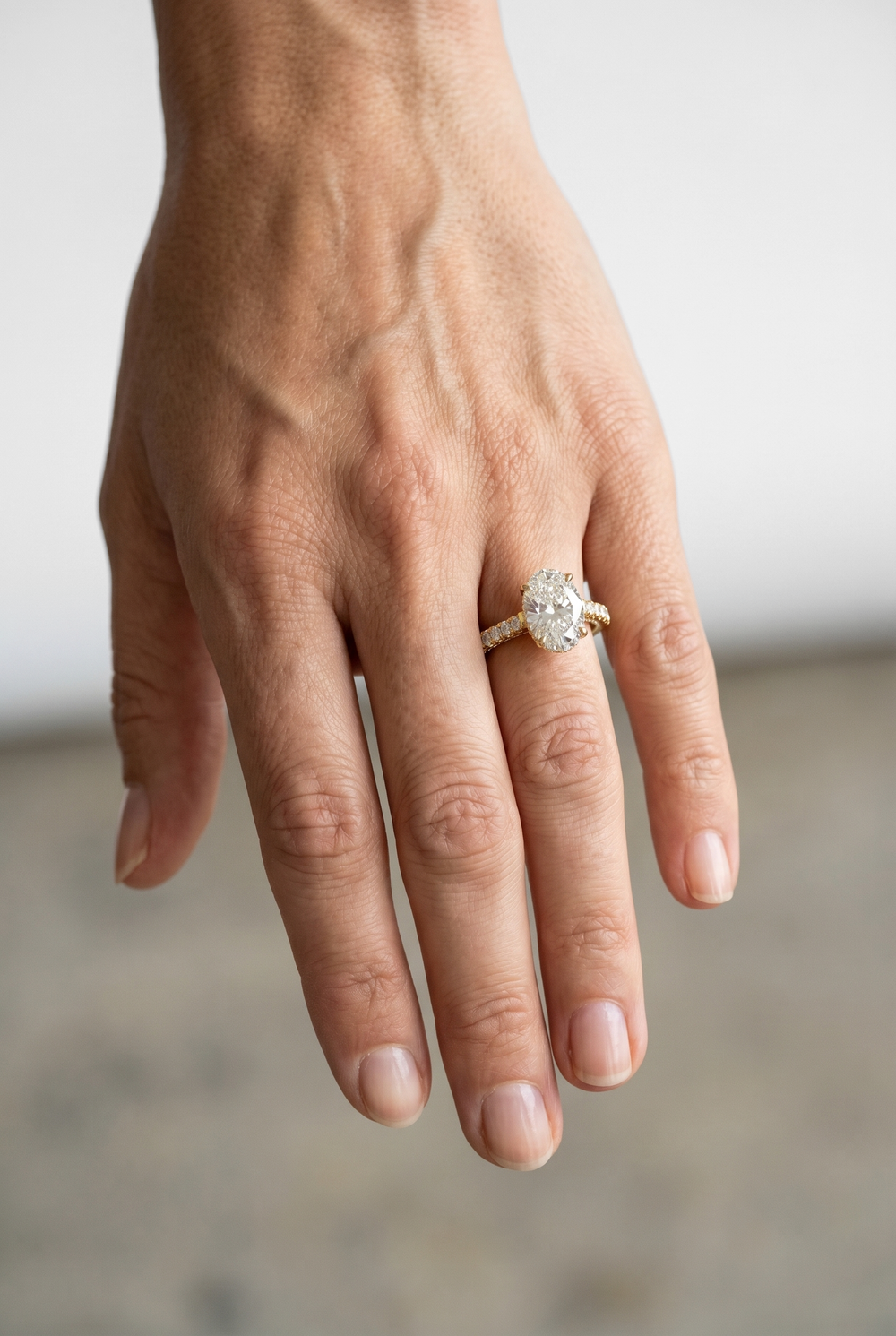 2.91 CTW Oval Lab Grown Diamond Ring with Hidden Halo Design in 18K Yellow Gold