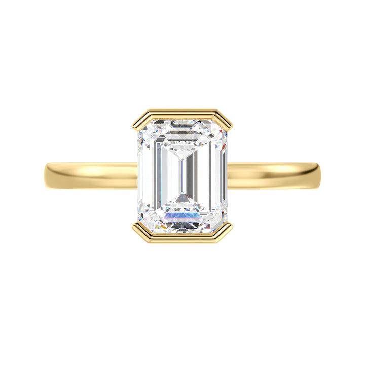 2 Carat Emerald Cut Diamond Bezel Engagement Ring in Yellow Gold