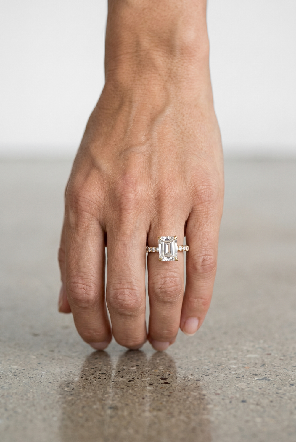 2 Carat Emerald Cut Lab Grown Diamond Ring with Hidden Halo in Yellow Gold