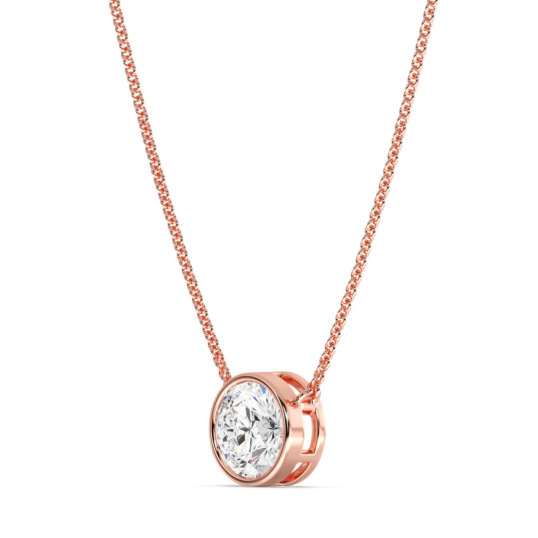 2 Carat Bezel-Set Round Lab-Grown Diamond Solitaire Pendant Necklace in 18K Rose Gold. IGI-certified E/VS diamond set in a modern bezel setting with a delicate rose gold chain, exuding warmth and elegance