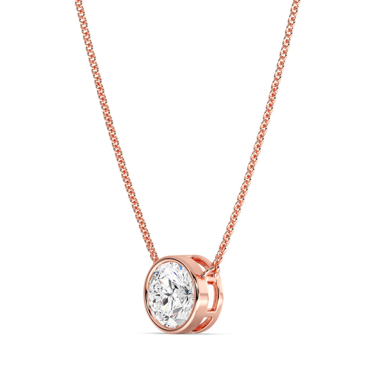 2 Carat Bezel-Set Round Lab-Grown Diamond Solitaire Pendant Necklace in 18K Rose Gold. IGI-certified E/VS diamond set in a modern bezel setting with a delicate rose gold chain, exuding warmth and elegance