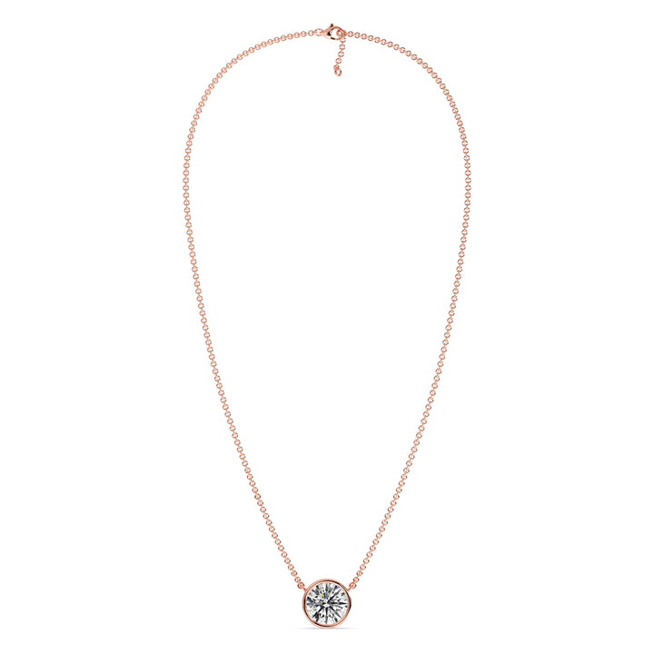 2 Carat Bezel-Set Round Lab-Grown Diamond Solitaire Pendant Necklace in 18K Rose Gold. IGI-certified E/VS diamond set in a modern bezel setting with a delicate rose gold chain, exuding warmth and elegance