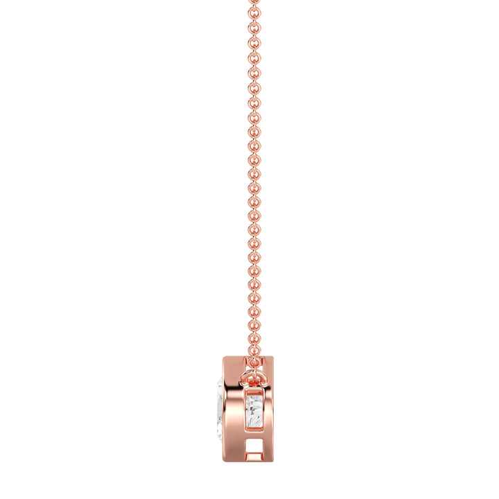 2 Carat Bezel-Set Round Lab-Grown Diamond Solitaire Pendant Necklace in 18K Rose Gold. IGI-certified E/VS diamond set in a modern bezel setting with a delicate rose gold chain, exuding warmth and elegance