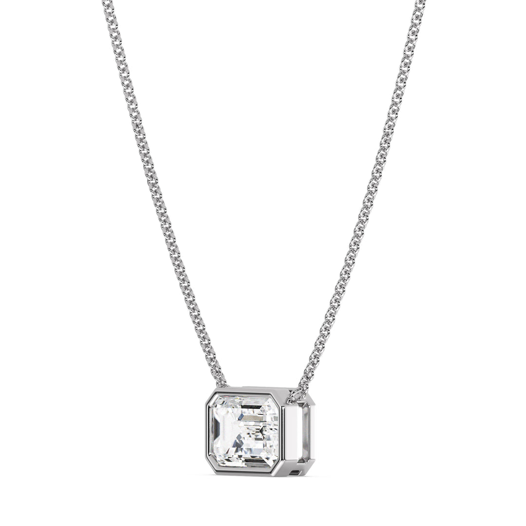 2 Carat Lab-Grown Emerald-Cut Diamond Bezel-Set Solitaire Pendant Necklace in 18K White Gold, highlighting a brilliant E/VS emerald-cut diamond in a contemporary bezel setting with a polished white gold chain.