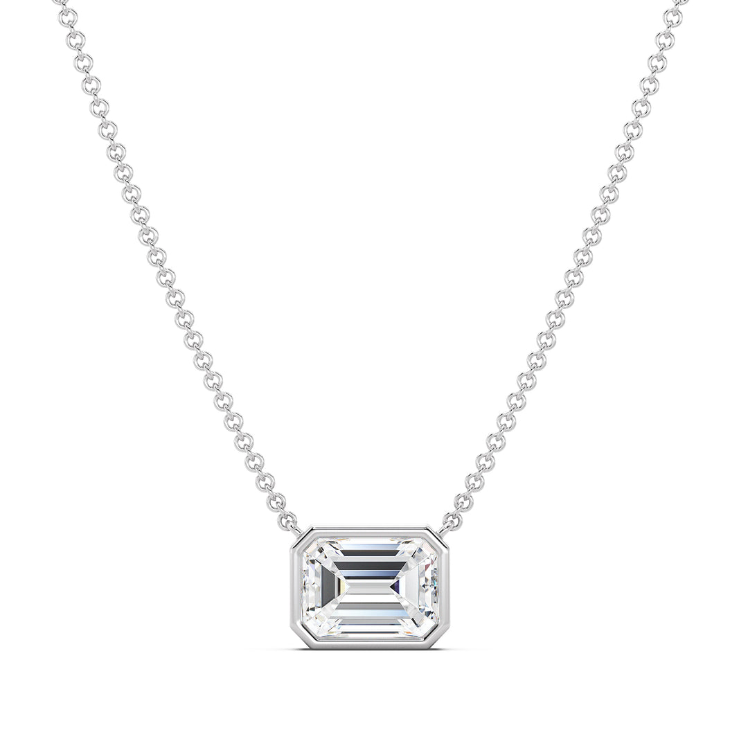 2 Carat Lab-Grown Emerald-Cut Diamond Bezel-Set Solitaire Pendant Necklace in 18K White Gold, highlighting a brilliant E/VS emerald-cut diamond in a contemporary bezel setting with a polished white gold chain.