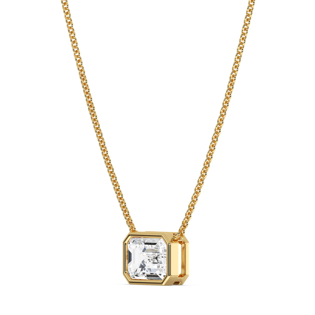 2 Carat Lab-Grown Emerald-Cut Diamond Bezel-Set Solitaire Pendant Necklace in 18K Yellow Gold, showcasing a sparkling E/VS emerald-cut diamond in a sleek bezel setting with a classic yellow gold chain.