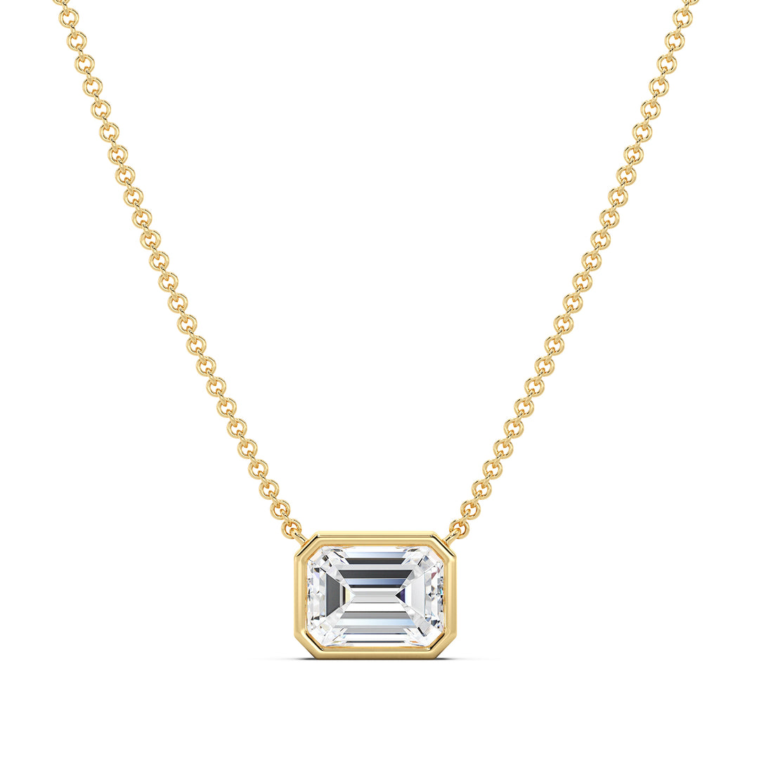 2 Carat Lab-Grown Emerald-Cut Diamond Bezel-Set Solitaire Pendant Necklace in 18K Yellow Gold, showcasing a sparkling E/VS emerald-cut diamond in a sleek bezel setting with a classic yellow gold chain.