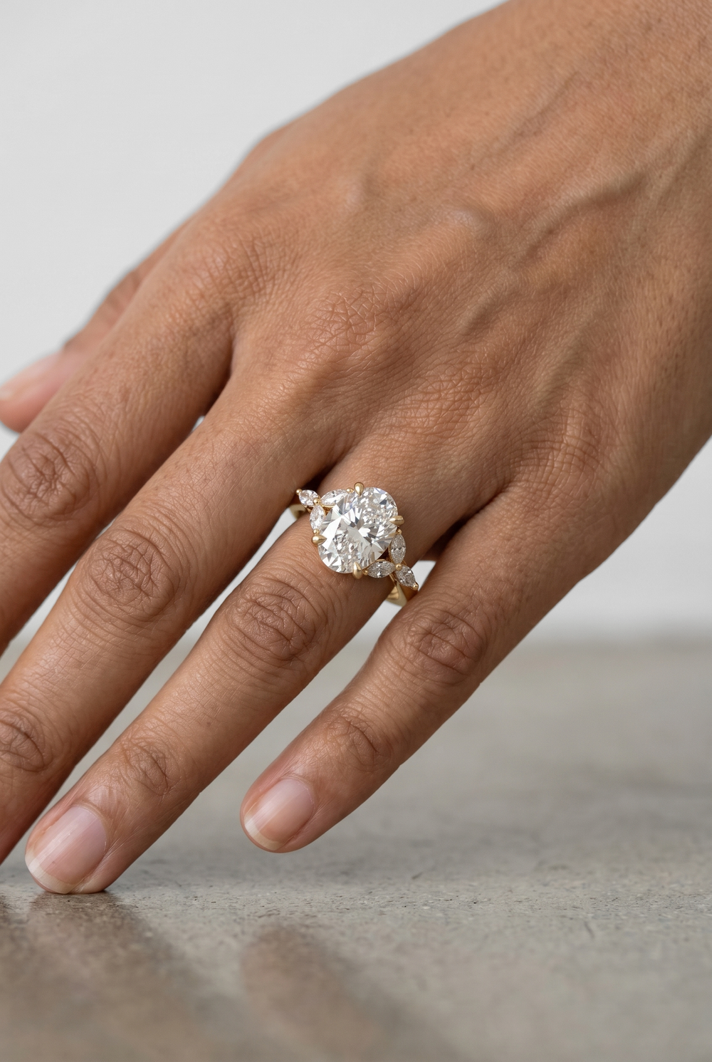 3.36 Ct Oval Lab Grown Diamond Ring with Marquise Accent Diamonds in Yellow Gold