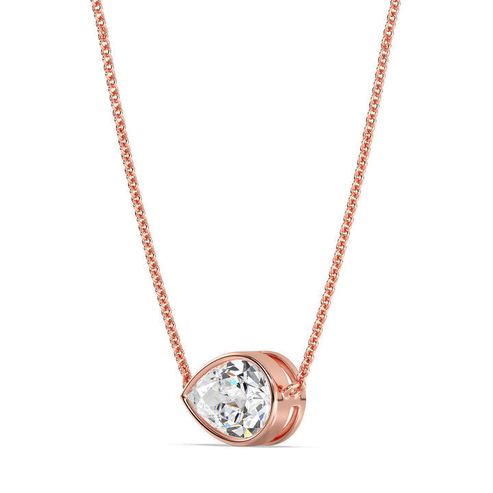 Close-up image of a 2 Carat Lab-Grown Pear-Cut Diamond Bezel-Set Solitaire Pendant Necklace in 18K Rose Gold, featuring a shimmering E/VS pear-cut diamond on a delicate rose gold chain