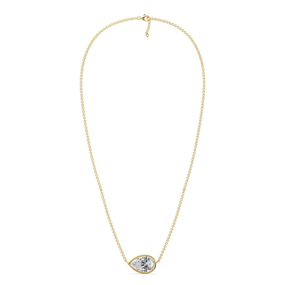 Elegant 2 Carat Lab-Grown Pear-Cut Diamond Bezel-Set Solitaire Pendant Necklace in 18K Yellow Gold, showcasing a radiant E/VS pear-cut diamond in a smooth bezel setting.