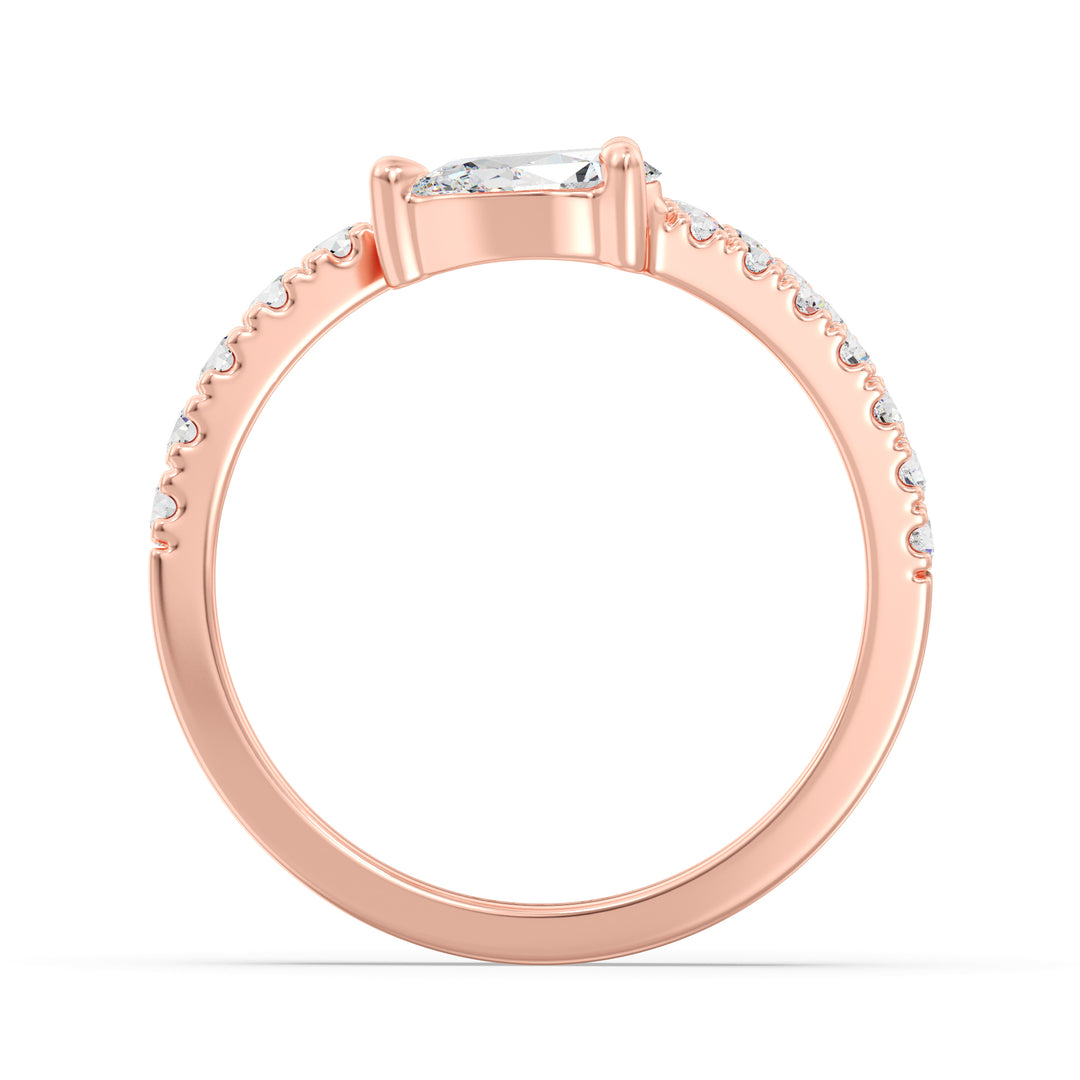 Elegant Pear-Shaped Lab-Grown Diamond Adjustable Open Cuff Ring in 18K Rose Gold, showcasing a 0.50ct pear-shaped diamond at the center with 25 round-cut diamonds totaling 0.45ct. The romantic blush hue of rose gold beautifully complements the sparkling diamonds, offering a modern and elegant aesthetic.