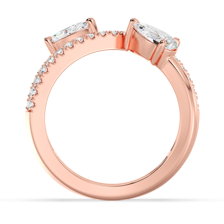 Elegant Pear-Shaped Lab-Grown Diamond Dual-Stone Twisted Ring in 18K Rose Gold with two 0.50 ct EF/VS pear-cut diamonds and 21 round-cut diamonds