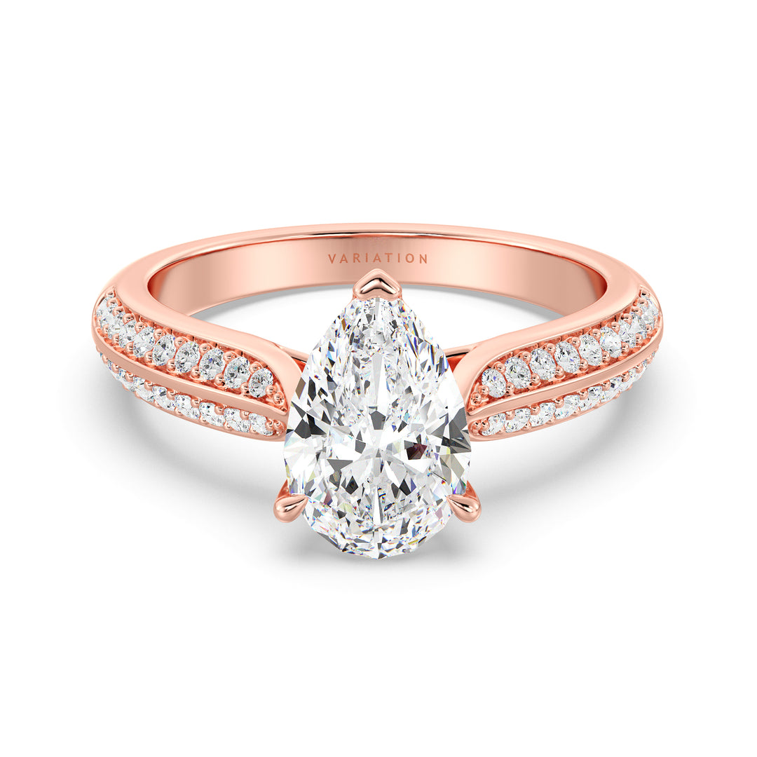 Elegant Pear Cut Lab Grown Diamond Engagement Ring with Pavé Band in 18K Rose Gold, showcasing a pear-shaped center diamond and pavé-set round diamonds