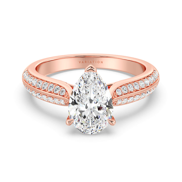 Elegant Pear Cut Lab Grown Diamond Engagement Ring with Pavé Band in 18K Rose Gold, showcasing a pear-shaped center diamond and pavé-set round diamonds