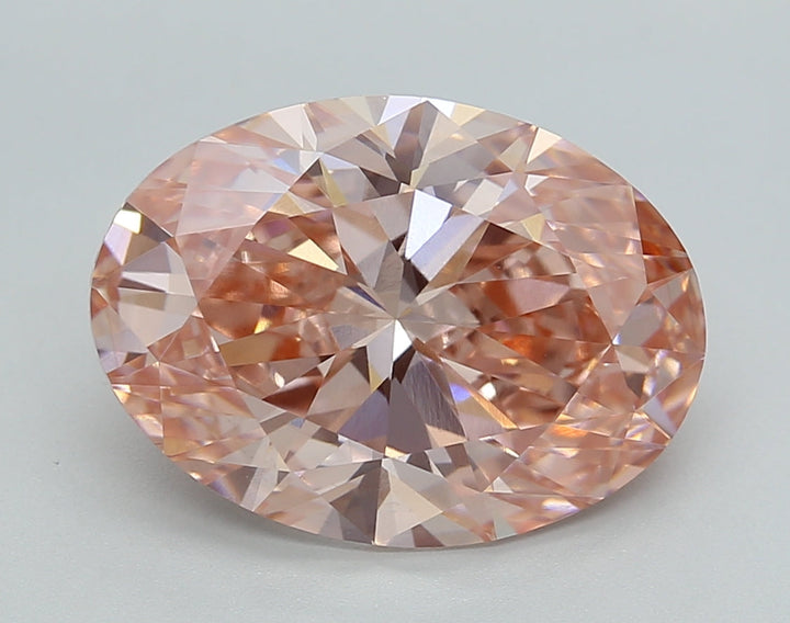 Oval-cut 5.10 ct. CVD diamond from IGI Certified lab, Fancy Vivid Pink color, VS1 clarity.