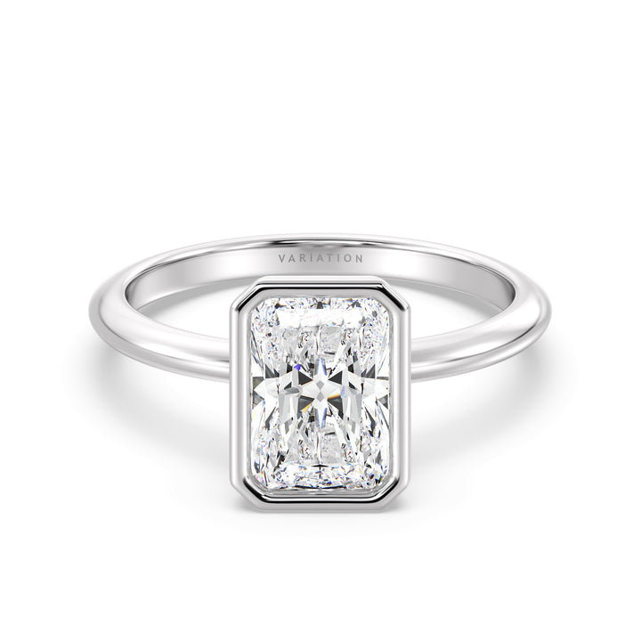 Radiant Cut Lab-Grown Diamond Solitaire Ring in 18K White Gold. Features a stunning radiant cut diamond set in a sleek bezel setting, highlighting timeless sophistication with a cool, silvery finish