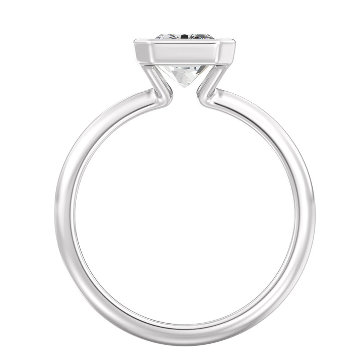 Radiant Cut Lab-Grown Diamond Solitaire Ring in 18K White Gold. Features a stunning radiant cut diamond set in a sleek bezel setting, highlighting timeless sophistication with a cool, silvery finish