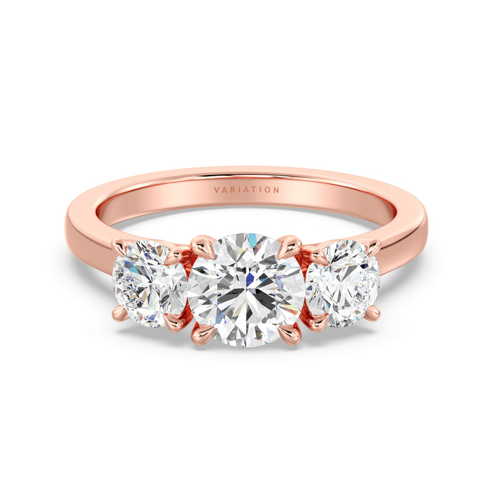 Three-Stone Round Cut Lab-Grown Diamond Engagement Ring in Rose Gold with Claw Setting, featuring a 1ct center diamond and two 0.50ct side diamonds, accented with pave diamonds