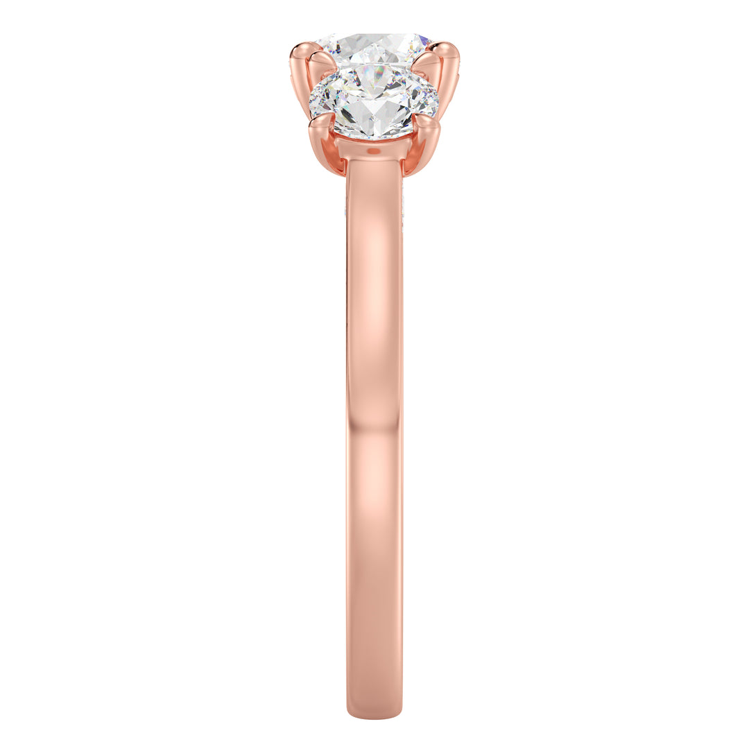 Three-Stone Round Cut Lab-Grown Diamond Engagement Ring in Rose Gold with Claw Setting, featuring a 1ct center diamond and two 0.50ct side diamonds, accented with pave diamonds