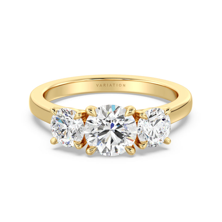 Three-Stone Round Cut Lab-Grown Diamond Engagement Ring in Yellow Gold with Claw Setting, featuring a 1ct center diamond and two 0.50ct side diamonds, accented with pave diamonds