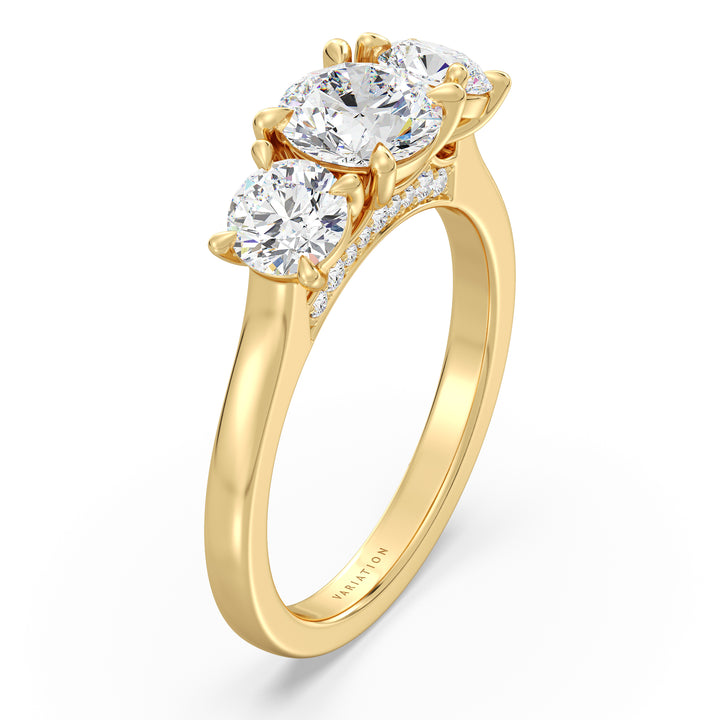 Three-Stone Round Cut Lab-Grown Diamond Engagement Ring in Yellow Gold with Claw Setting, featuring a 1ct center diamond and two 0.50ct side diamonds, accented with pave diamonds