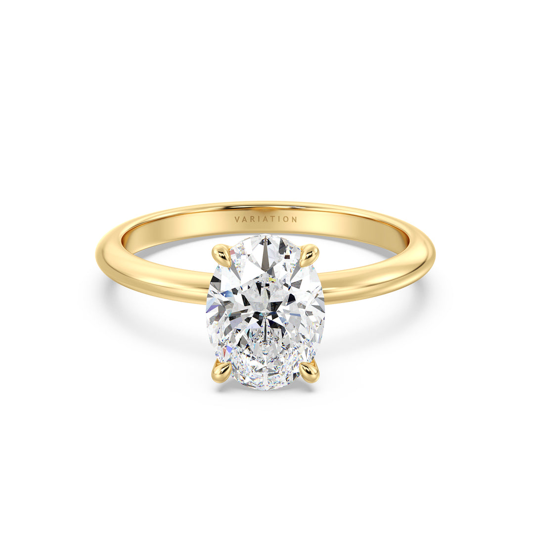 Timeless 4-Claw Oval Lab-Grown Diamond Solitaire Engagement Ring in 18K Yellow Gold, showcasing a brilliant oval-cut diamond in a traditional prong setting