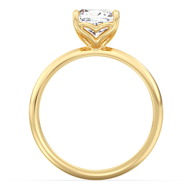 Timeless cushion cut lab grown diamond solitaire ring in 18K yellow gold with a secure 4-claw prong setting.