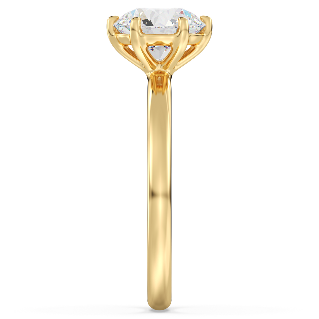 Timeless round brilliant cut lab grown diamond solitaire ring in 18K yellow gold with extraordinary sparkle and elegant design.