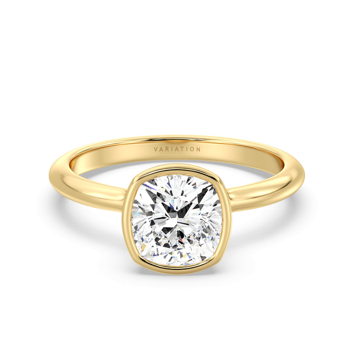 Elegant cushion cut lab grown diamond bezel engagement ring crafted in 18K yellow gold with a sleek contemporary design.