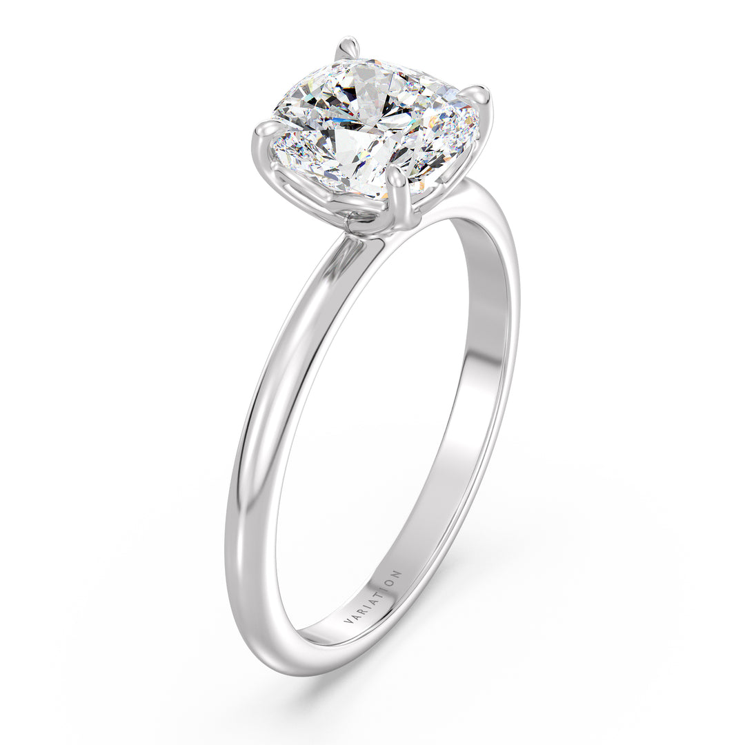 Cushion cut lab grown diamond solitaire ring in 18K white gold with an IGI certified diamond and timeless solitaire design.