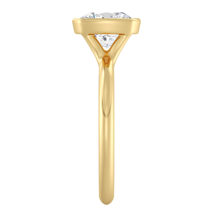 IGI certified cushion cut lab grown diamond bezel solitaire ring in BIS hallmarked 18K yellow gold.