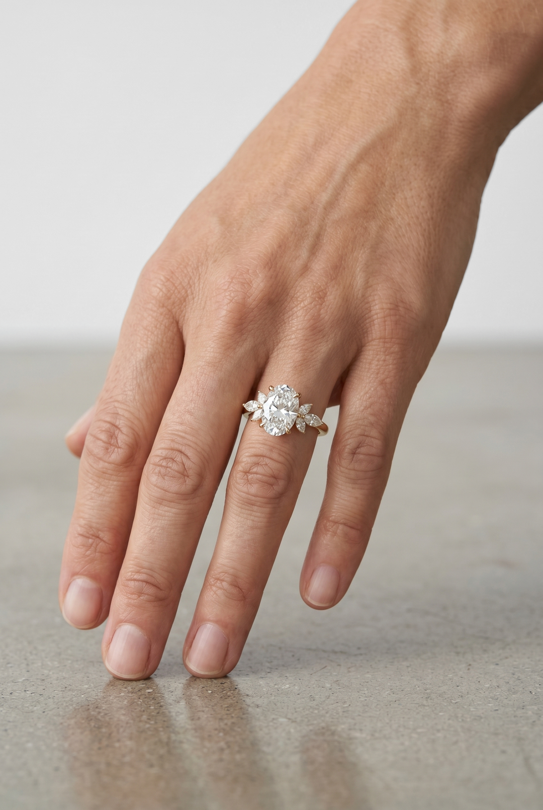 Elegant 2 Carat Oval Lab Grown Diamond Ring with Marquise Cut Accent Diamonds in 18K Yellow Gold