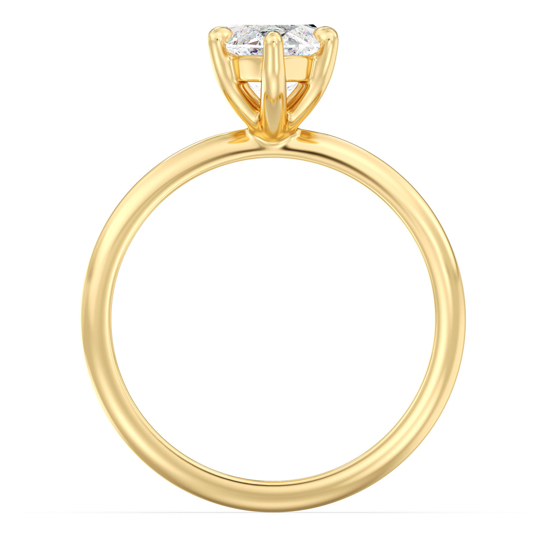 Marquise cut lab grown diamond ring in 18K yellow gold showcasing an elongated silhouette and exceptional sparkle.