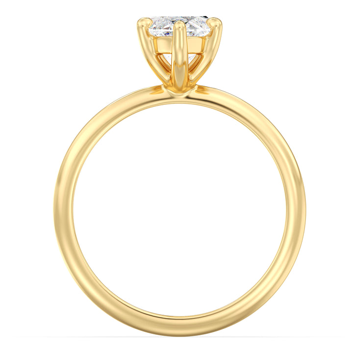 Marquise cut lab grown diamond ring in 18K yellow gold showcasing an elongated silhouette and exceptional sparkle.