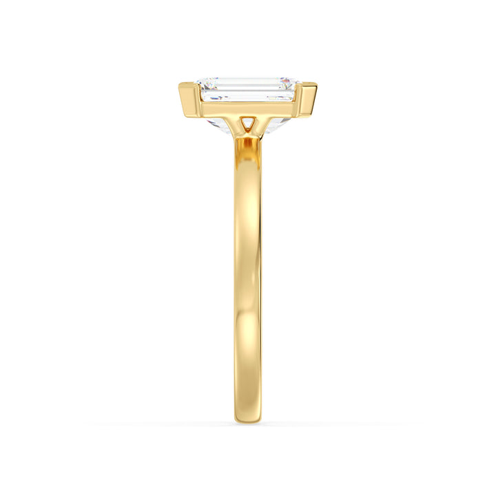 Emerald Cut Lab Grown Diamond Ring with Modern Bezel Setting in Yellow Gold