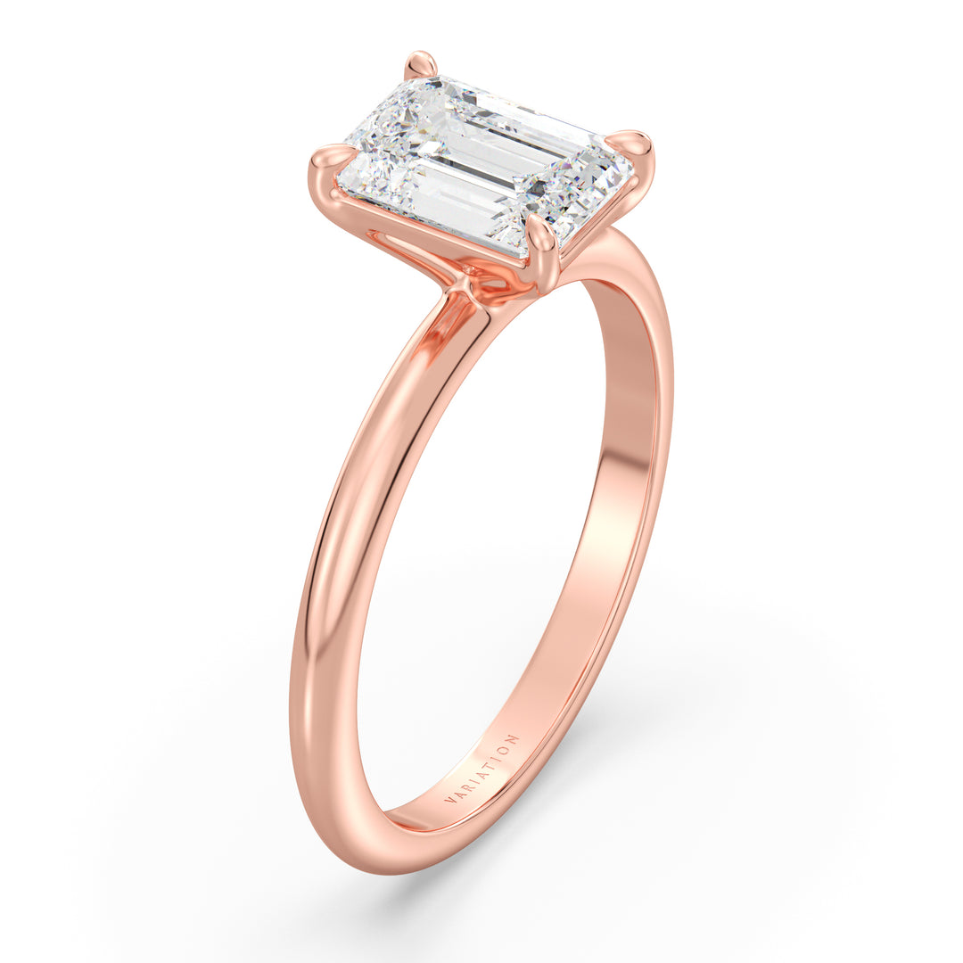 Emerald cut lab grown diamond solitaire ring in 18K rose gold featuring an IGI certified diamond with exceptional clarity and elegance.