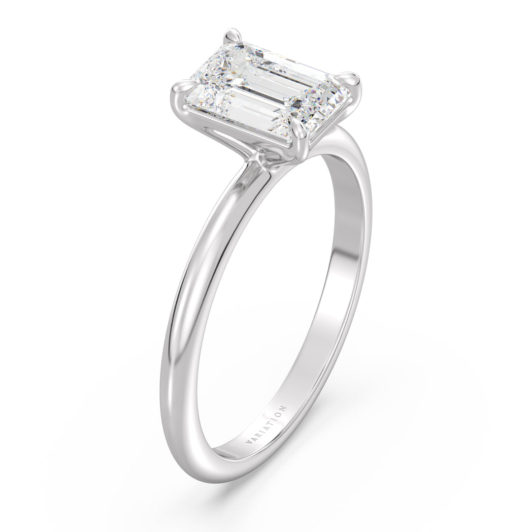 Emerald cut lab grown diamond solitaire ring in 18K white gold with a stunning IGI certified diamond and sophisticated solitaire setting.