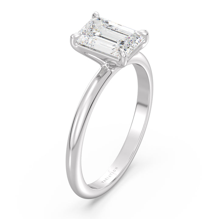 Emerald cut lab grown diamond solitaire ring in 18K white gold with a stunning IGI certified diamond and sophisticated solitaire setting.