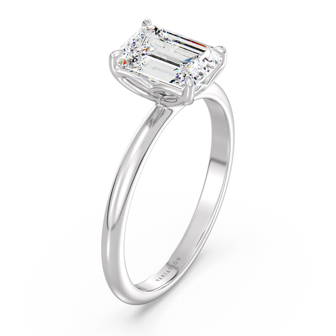 Emerald cut lab grown diamond solitaire ring in 18K white gold with an IGI certified diamond and timeless solitaire design.