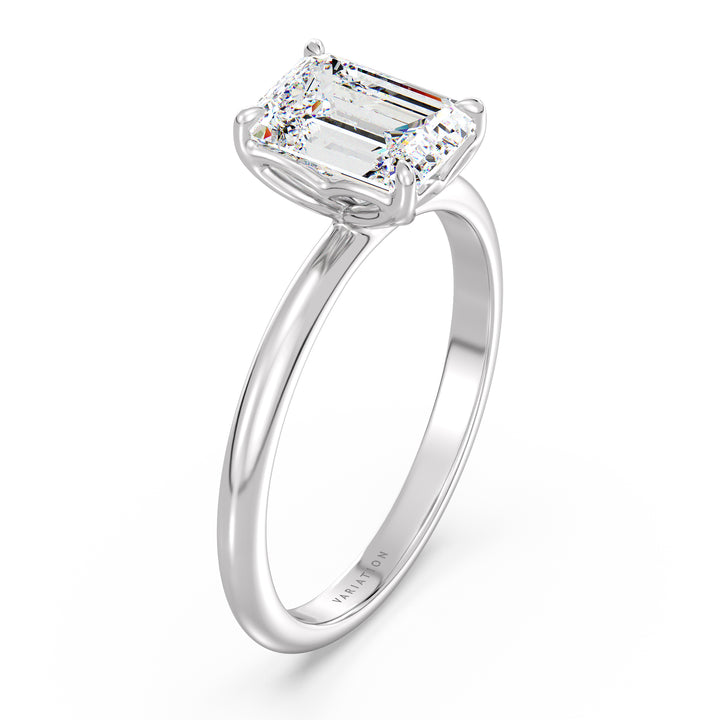 Emerald cut lab grown diamond solitaire ring in 18K white gold with an IGI certified diamond and timeless solitaire design.