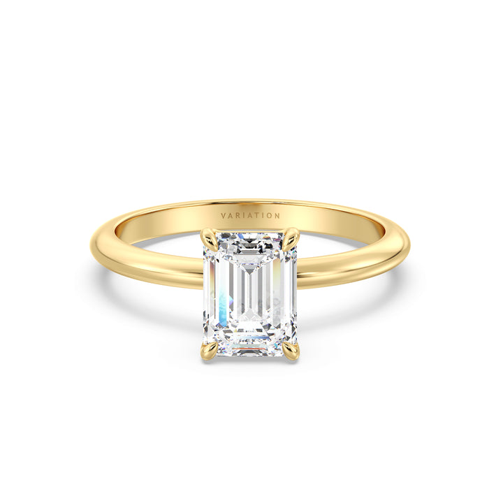Emerald cut lab grown diamond solitaire ring in 18K yellow gold featuring an IGI certified diamond in a classic 4-prong setting.