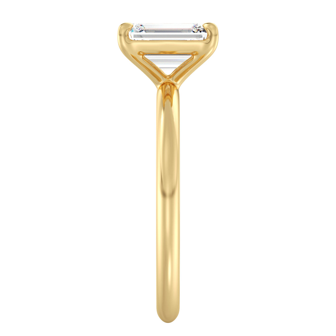 IGI certified emerald cut lab grown diamond solitaire ring in BIS hallmarked 18K yellow gold.