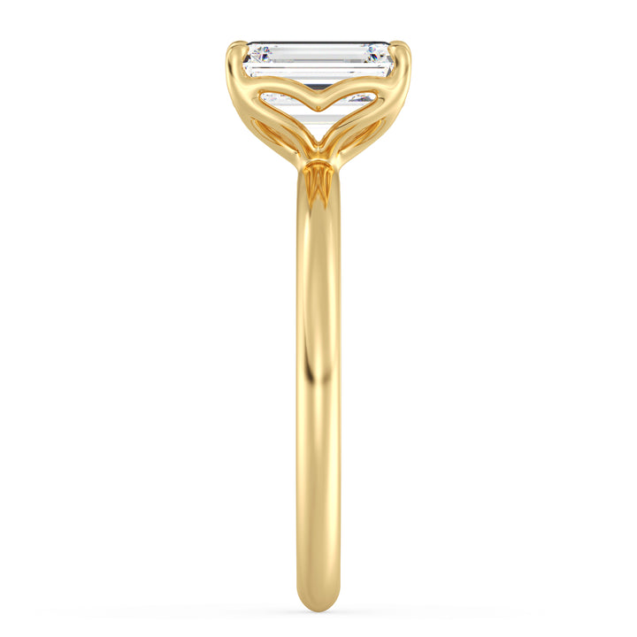 IGI certified emerald cut lab grown diamond solitaire ring in BIS hallmarked 18K yellow gold.