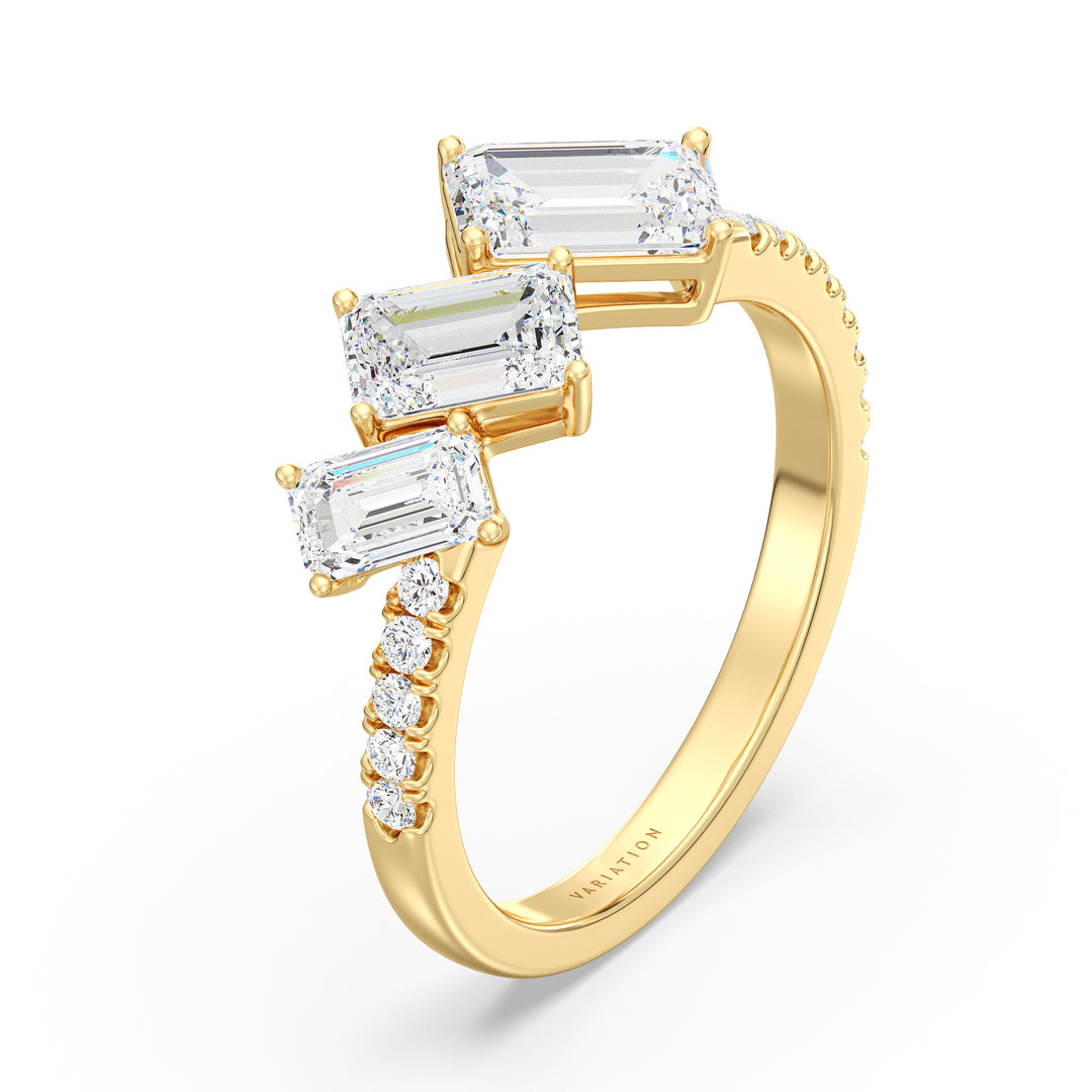 Emerald Diamond Three Stone Halo Ring with Accent Diamonds in Yellow Gold