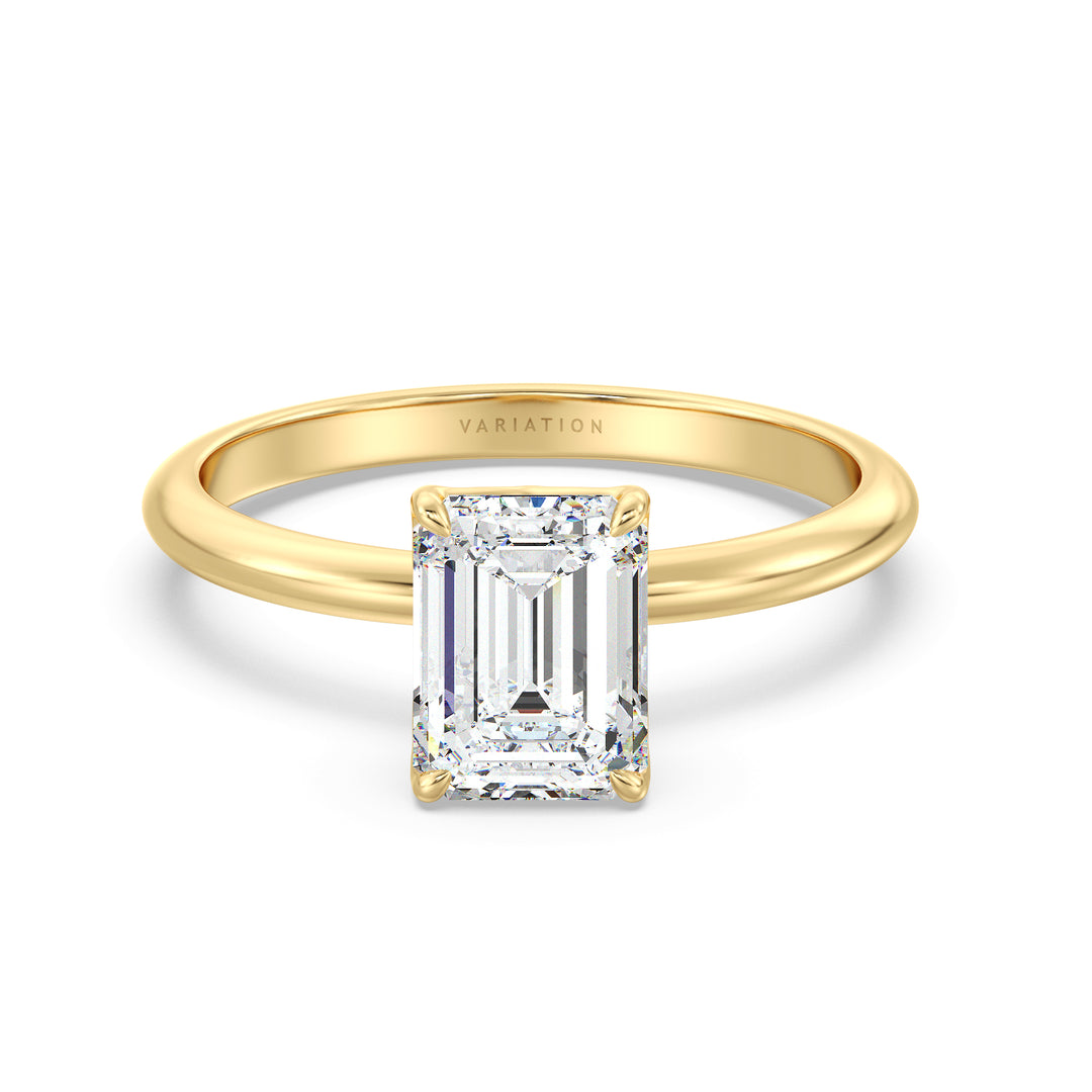 Elegant emerald cut lab grown diamond solitaire ring crafted in 18K yellow gold with exceptional clarity and a timeless design.