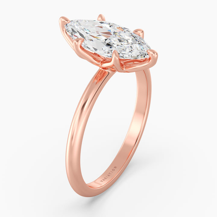 Marquise cut lab grown diamond solitaire ring in 18K rose gold featuring an IGI certified diamond with an elegant open basket setting.